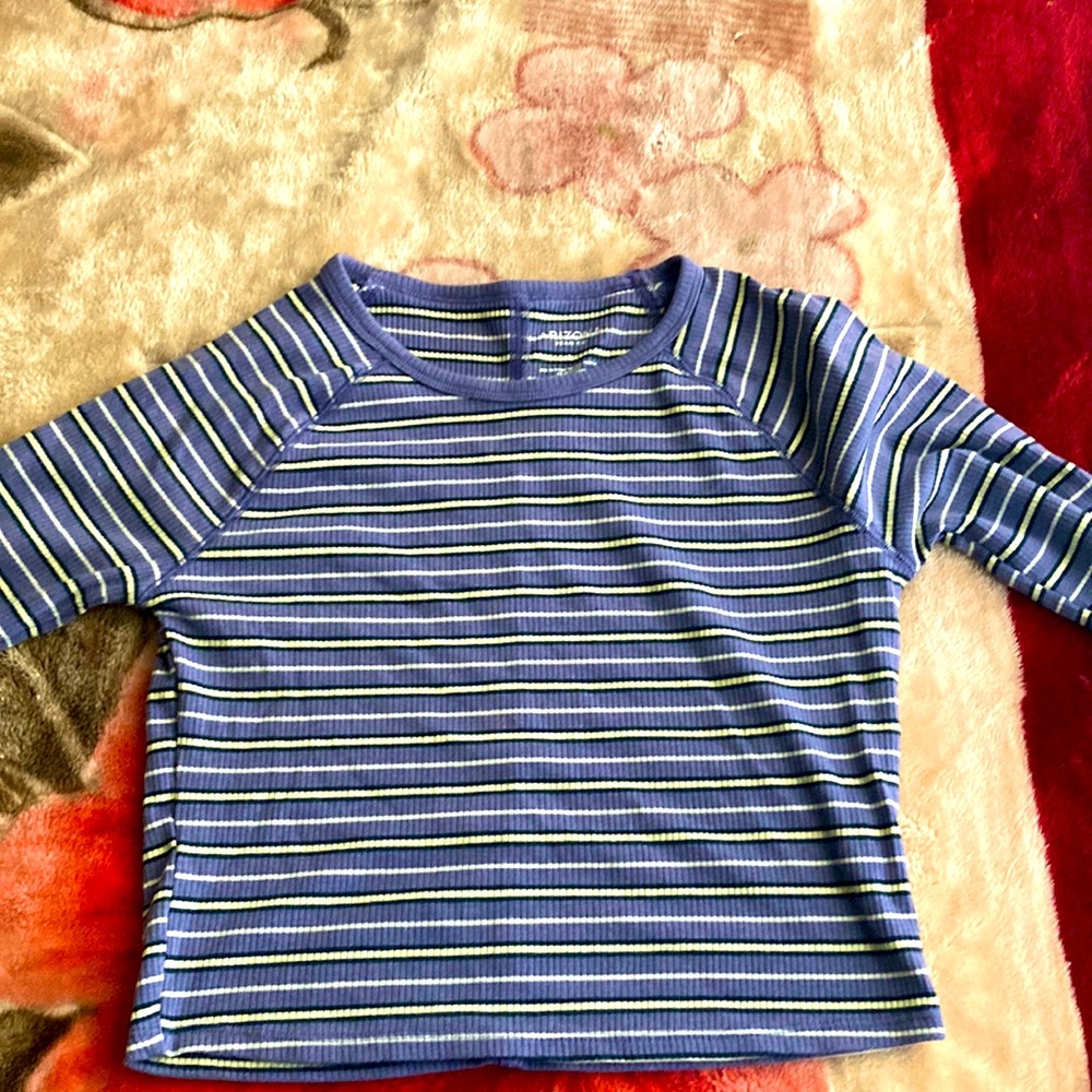 I’m selling this purple and white striped long sleeved shirt